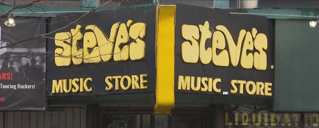 Exterior view of Steve’s Music Store sign in a retail area.